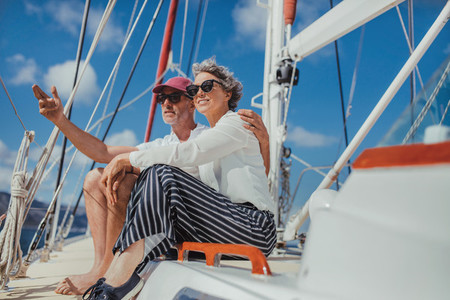 Relaxed mature couple on a yacht