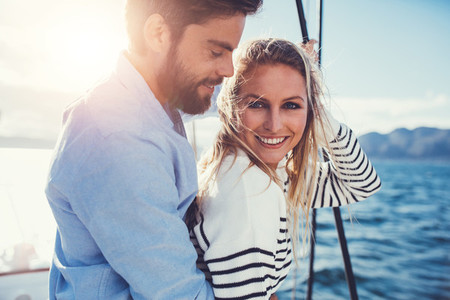 Couple enjoying their summer holidays on boat trip