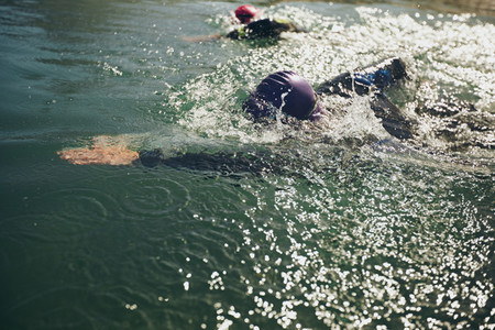Athletes swimming in a competition