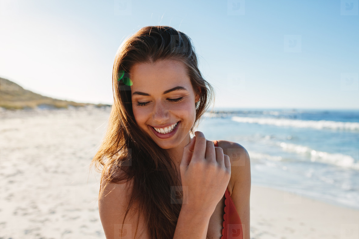 Sensual young woman on the beach