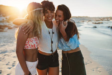 Group of beautiful young women enjoying beach vacation