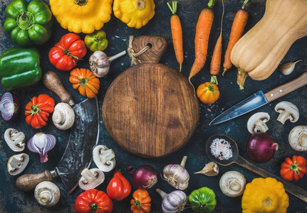 Fall harvest vegetable ingredients and knives for healthy cooking