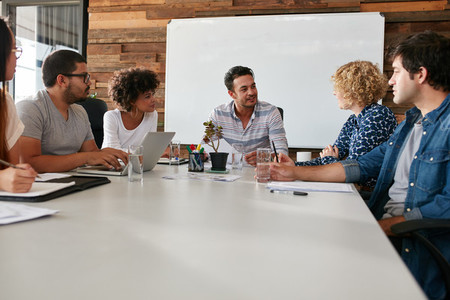 Office workers meeting in a boardroom