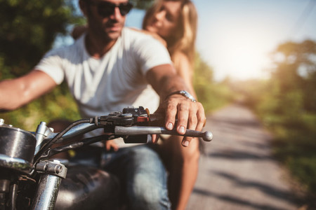 Young couple on motorcycle