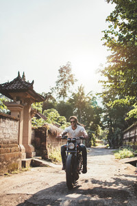 Young couple out on a motorbike ride