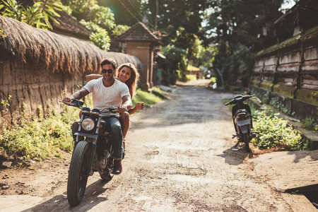 Young couple on motorcycle ride