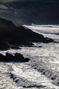 Big waves over cliffs