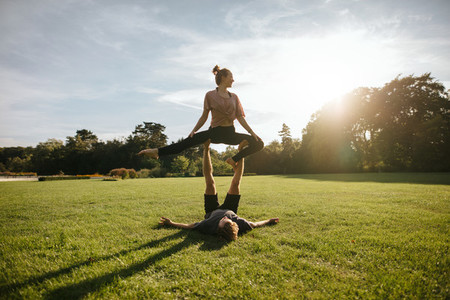 Acro yoga workout on grass