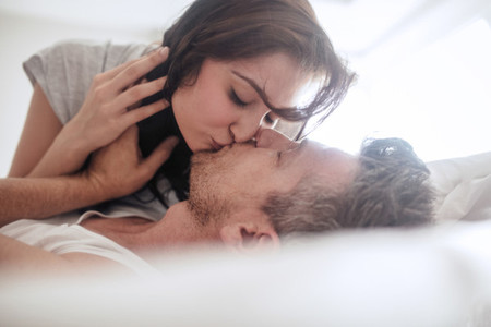 Young couple being romantic and kissing