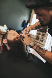 Man having a shave at the barber shop
