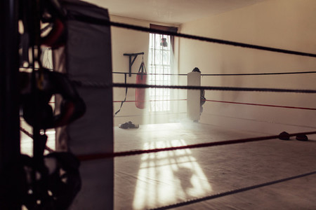 Empty boxing ring as seen from one corner