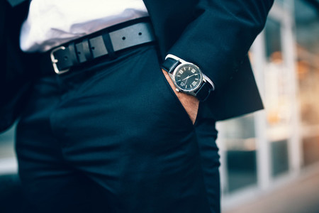Business man039 s hand in pocket wearing a watch