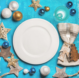 Christmas New Year holiday background with white plate in center