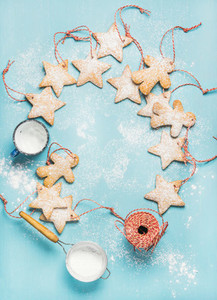 Christmas gingerbread cookies with sugar powder and decoration rope