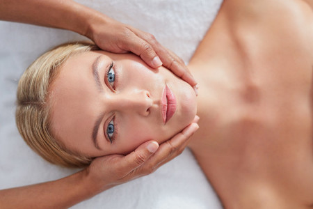 Woman enjoying beauty treatment at spa
