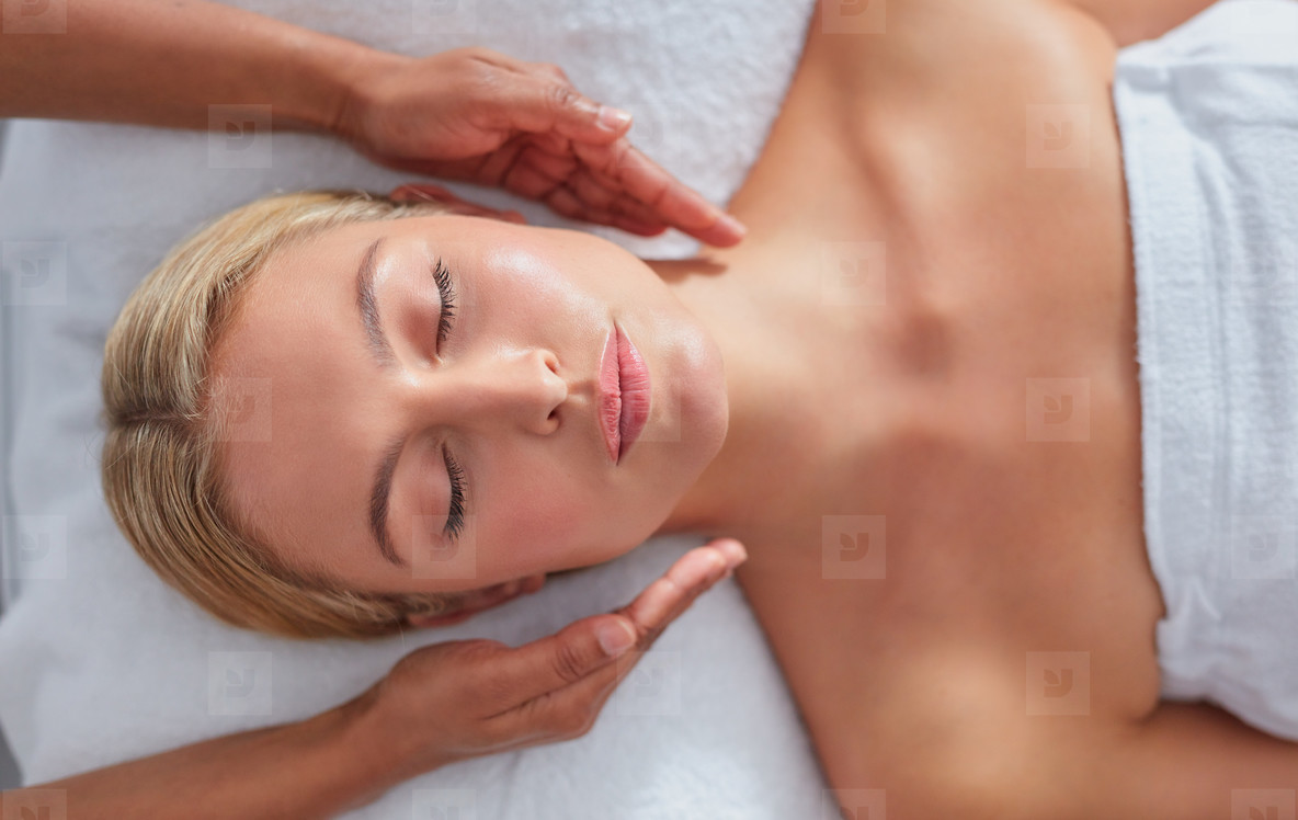 Woman receiving beauty treatment at dayspa