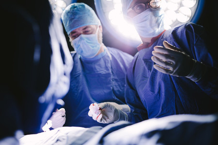 Medical professionals during surgery operating room