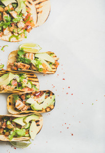 Allergy friendly healthy corn tortillas with grilled chicken fillet  avocado  lime