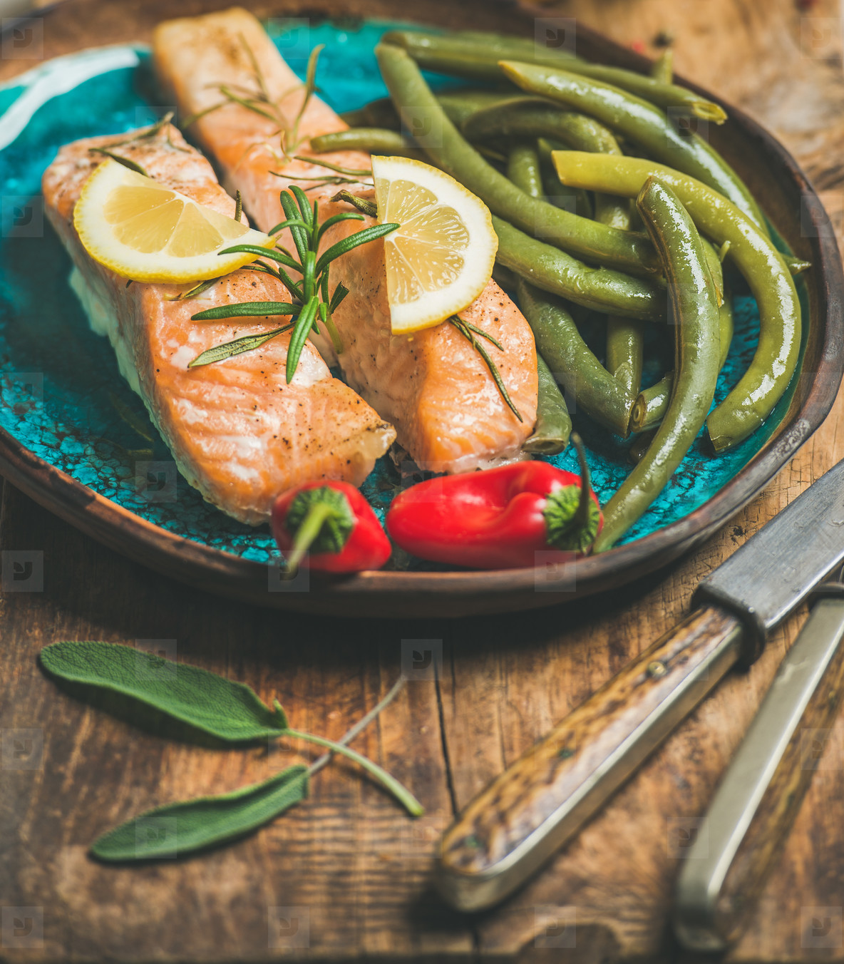 Roasted salmon with lemon  rosemary  chilli pepper and beans