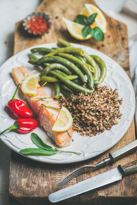 Roasted salmon with quinoa  pepper and poached beans in plate