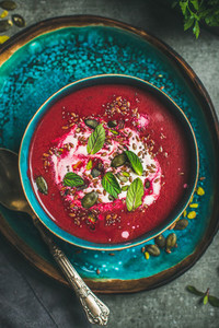 Beetroot soup with mint  chia  flax  pumpkin seeds  top view