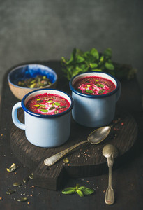 Detox beetroot soup with mint  pistachio and seeds  copy space