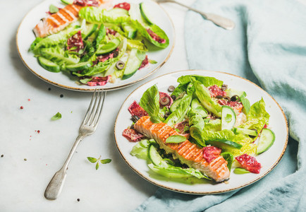 Healthy energy boosting spring salad with grilled salmon