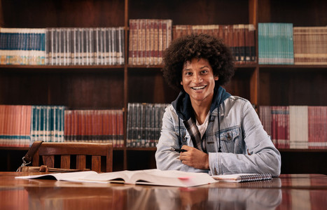 College student sitting in library