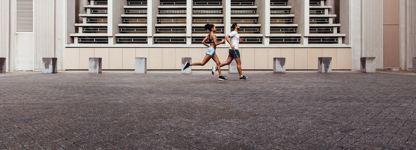 Man and woman running in the morning