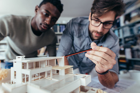 Architects working on new architectural house model