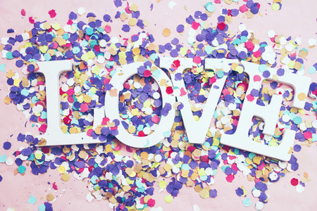 Love word and confetti