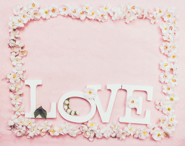 Word love and a floral frame