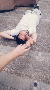 Young man lying on floor