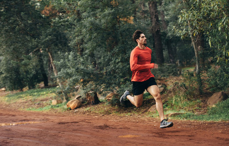 Athlete running in a park