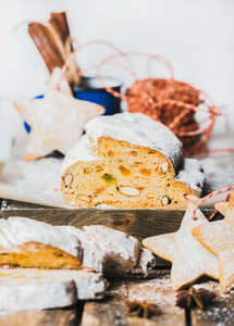 Traditional German Christmas cake Stollen with gingerbread cookies