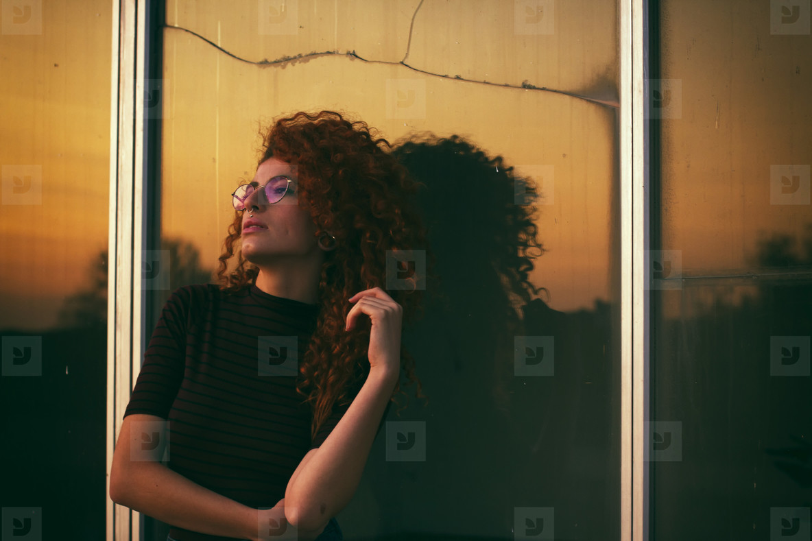Redhead woman at sunset