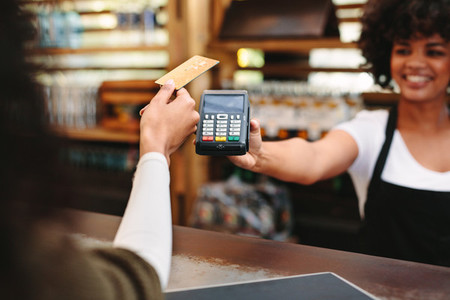 Customer paying bill using card