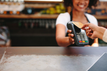 Customer paying bill using card