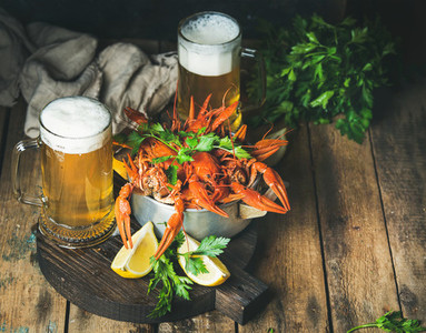 Wheat beer and boiled crayfish with lemon  fresh parsley