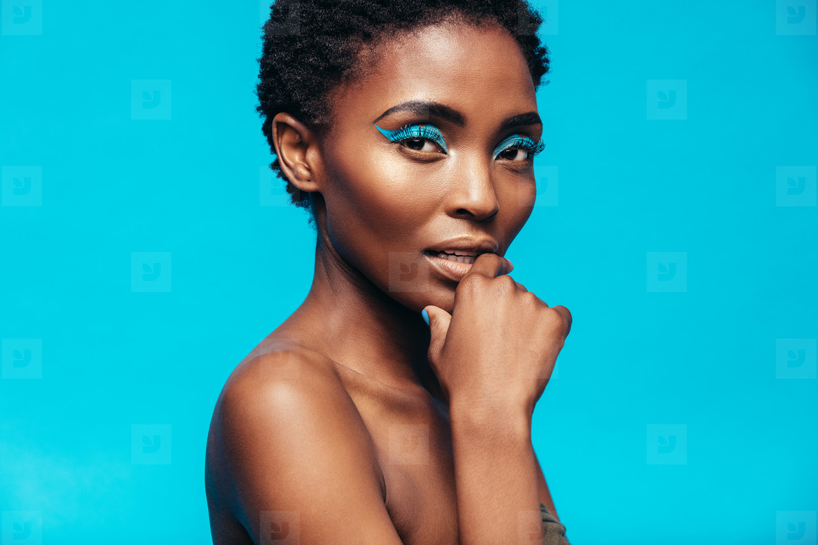 Sensual african female model with vivid makeup