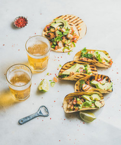 Gluten free healthy corn tortillas with beer in glasses