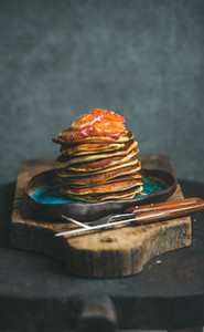 Pancakes with honey and bloody orange slices  copy space