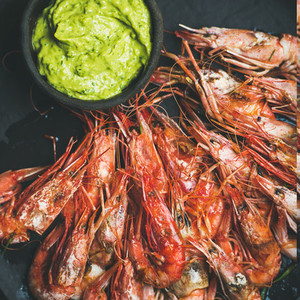 Roasted red shrimps with guacamole avocado sauce square crop