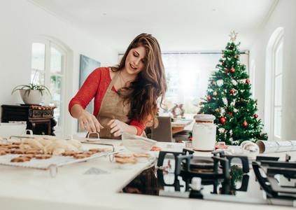 Woman preparing cookies for Christmas