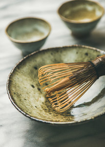 Japanese tools and bowls for brewing matcha tea selective focus