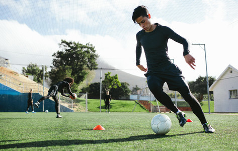Soccer player practicing ball control
