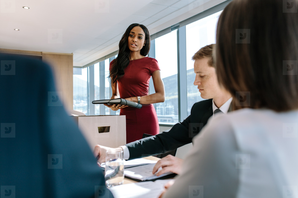 Office workers discussing new business strategy