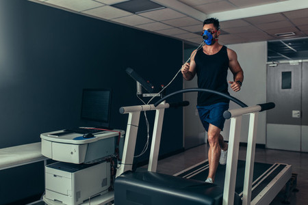Runner on treadmill at biomechanics lab