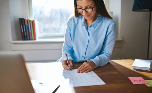 Successful female entrepreneur working at her desk