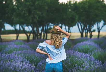 Young woman traveller standing in lavender field  Isparta  Turkey